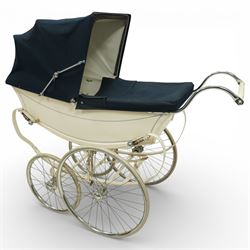 Mid-20th century Osnath pram, the cream painted metal body with navy fabric hood and apron...