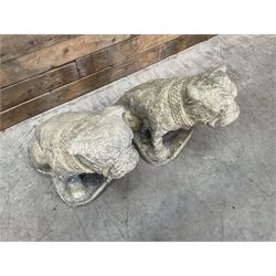 Pair of cast stone garden British bulldogs, on shaped plinths