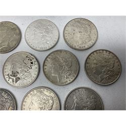 Eight United States of America silver Morgan dollar coins, dated 1882, 1884 O, 1884, 1885, two 1886, 1889, 1890 and a 1925 peace dollar