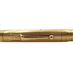 9ct gold Swan fountain pen, engine turned decoration with engraved name 'C.S.Lundgren' by Mabie Todd, London 1937, boxed 