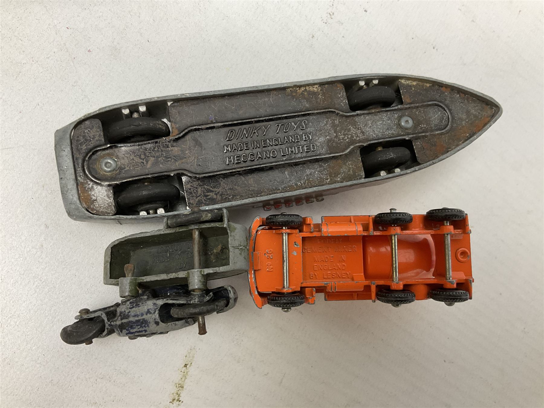 Dinky - sixteen unboxed and playworn die-cast models including Foden lorry, Big Bedford lorry with Halesowen Farm Trailer, Thunderbolt land speed record car, Spirit of the Wind racing car, market garden truck, Bedford tipper, station wagon, tanker, motorcycle combination etc; two Corgi models; and five Matchbox/Lesney models (23)