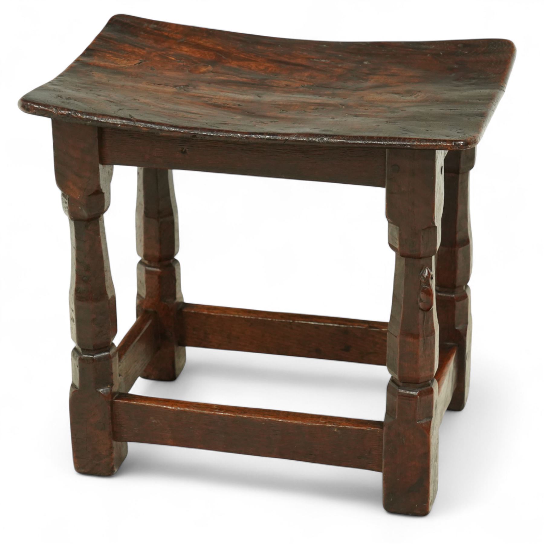Mouseman - 1930s adzed oak joint stool, dished figured burr oak seat, on shaped octagonal supports joined by stretchers, carved with mouse signature, by Robert Thompson of Kilburn