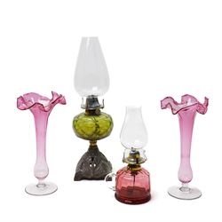 Late Victorian table oil lamp with green glass reservoir and metal base , cranberry glass ...