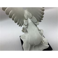 1930s Meissen figure of a seagull designed by Max Esser, modelled upon the crest of a wave with wings spread above its body, upon black square base, with blue cross swords mark, H43cm