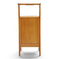 Mid-20th century teak side table with sliding top tray, raised sliding top above an open recess with two shelves, shaped frame support