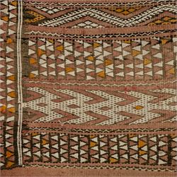 Berber style mid 20th century flat-weave kilim, woven is alternating horizontal bands of hooked lozenges, diamonds, and chevron motifs in a terracotta, ochre, ivory, and brown palette, framed by narrow geometric borders  