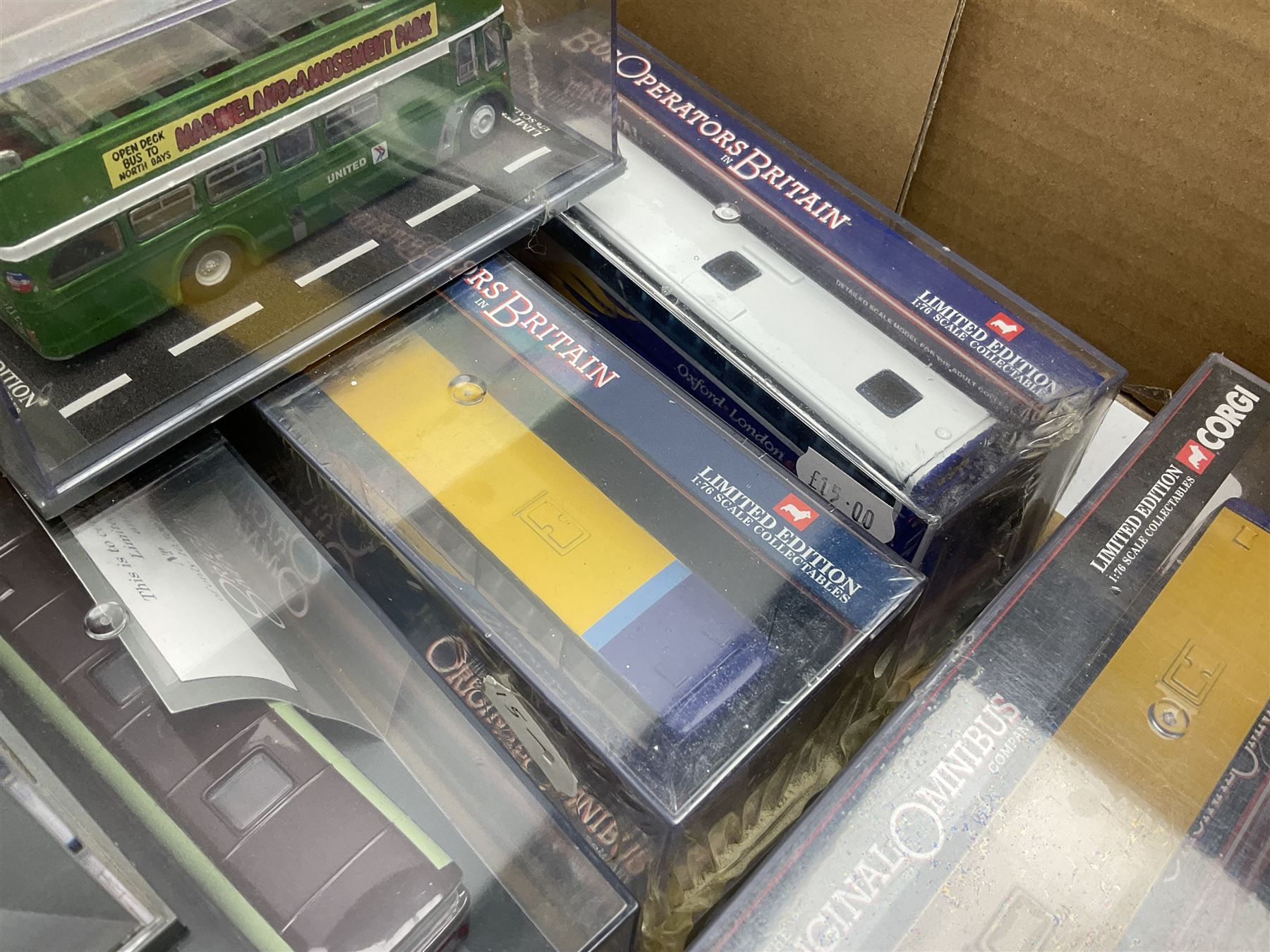 Corgi The Original Omnibus Company/Bus Operators in Britain - seventeen die-cast models of buses and coaches, predominantly limited edition; all in perspex display cases (17)