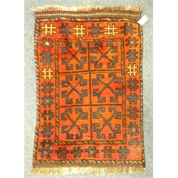  Old Persian Balochi rug/ mat, red ground with stylised motif, L99 x W67cm   