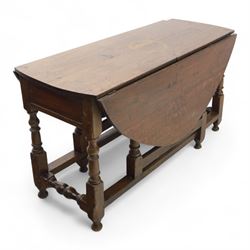 Early 19th century oak drop-leaf gateleg table, oval top above plain frieze, on ring turned legs joined by stretchers