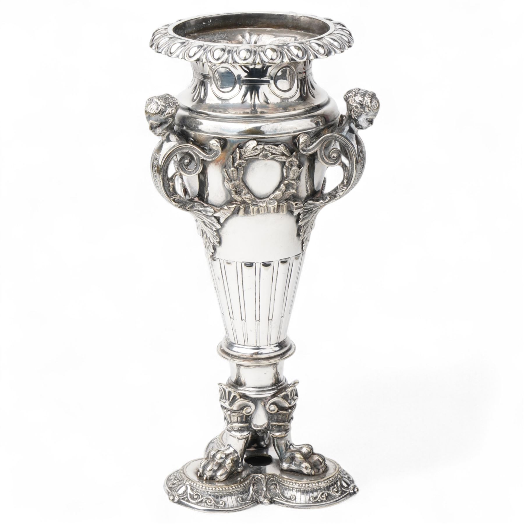 19th century silver plated vase of tapering form with lappet border and three caryatid handles surrounded with laurel wreath cartouches raised on triple paw feet on lobed base H28cm