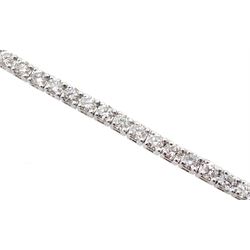 White gold diamond line bracelet, stamped 18K, total diamond weight 2.65 carat