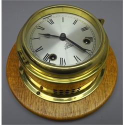  Iver Weilbach brass cased ship's bulkhead clock, silvered Roman dial inscribed 'Viking' twin train movement striking the half hours, on oak plaque, D19cm,   