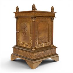 Early 20th century brass mantle clock, the face and case profusely engraved with floral scrolls, the sides inset with hunting scene panels, flanked by four Corinthian columns with acorn finials, striking the hours and halves on bell, H20.5cm W13cm