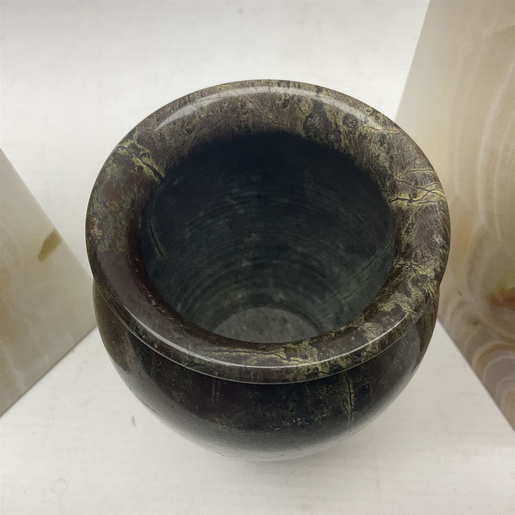 Alabaster bookends, together with marble vase 