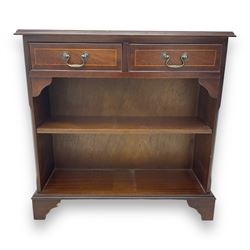 Early 20th century inlaid mahogany open bookcase, rectangular top with boxwood stringing and moulded edge over two short drawers, two open shelves below, on shaped bracket supports