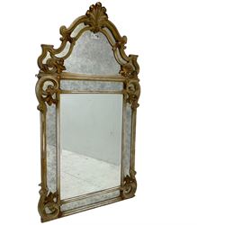 Victorian design parcel gilt wall mirror, shaped cresting with foliate cartouche pediment, decorated with C-scrolls and scrolled foliage, moulded frame with segmented mirror plates