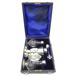  Early 20th century silver Travelling Communion set, in a fitted case, including chalice, paten, spoon, wafer box and two silver mounted glass flasks, London 1900-1948 11oz weighable silver  