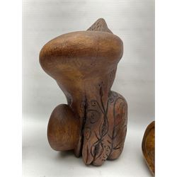 Helen Skelton (British 1933 – 2023): Three carved wooden abstract sculptures, each modelled as a cat, with carved or painted features, largest H63cm. Born into an RAF family in 1933 in Kent and travelled the world extensively during her childhood. After settling in Bridlington, Helen immersed herself in painting, textiles, and wood sculpture, often inspired by nature's beauty. Her talent was showcased in a one-woman show at Sewerby Hall and recognised with the sculpture prize at Ferens Art Gallery in 2000. Sadly, Helen’s daughter passed away from cancer in 2005. This loss inspired Helen to donate her sculptures to Marie Curie upon her passing in 2023.