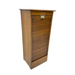 Early 20th century oak filing cabinet, tambour roll door enclosing nine slides