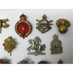 Twenty-six cap badges for Yeomanry and various guards including Fife & Forfar, Lothian and Border Horse, Leicestershire, Northamptonshire, Queens Own, Coldstream, Grenadier, Machine Gun Regiment, Life Guards etc (26)