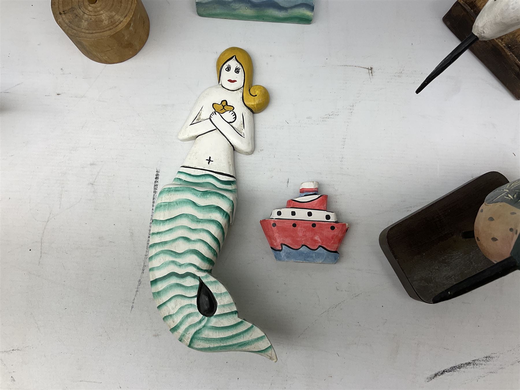  Nautical Items, to include a carved wooden seagull on a plinth, by Country Corner, three other carved wooden birds, wooden mermaid etc