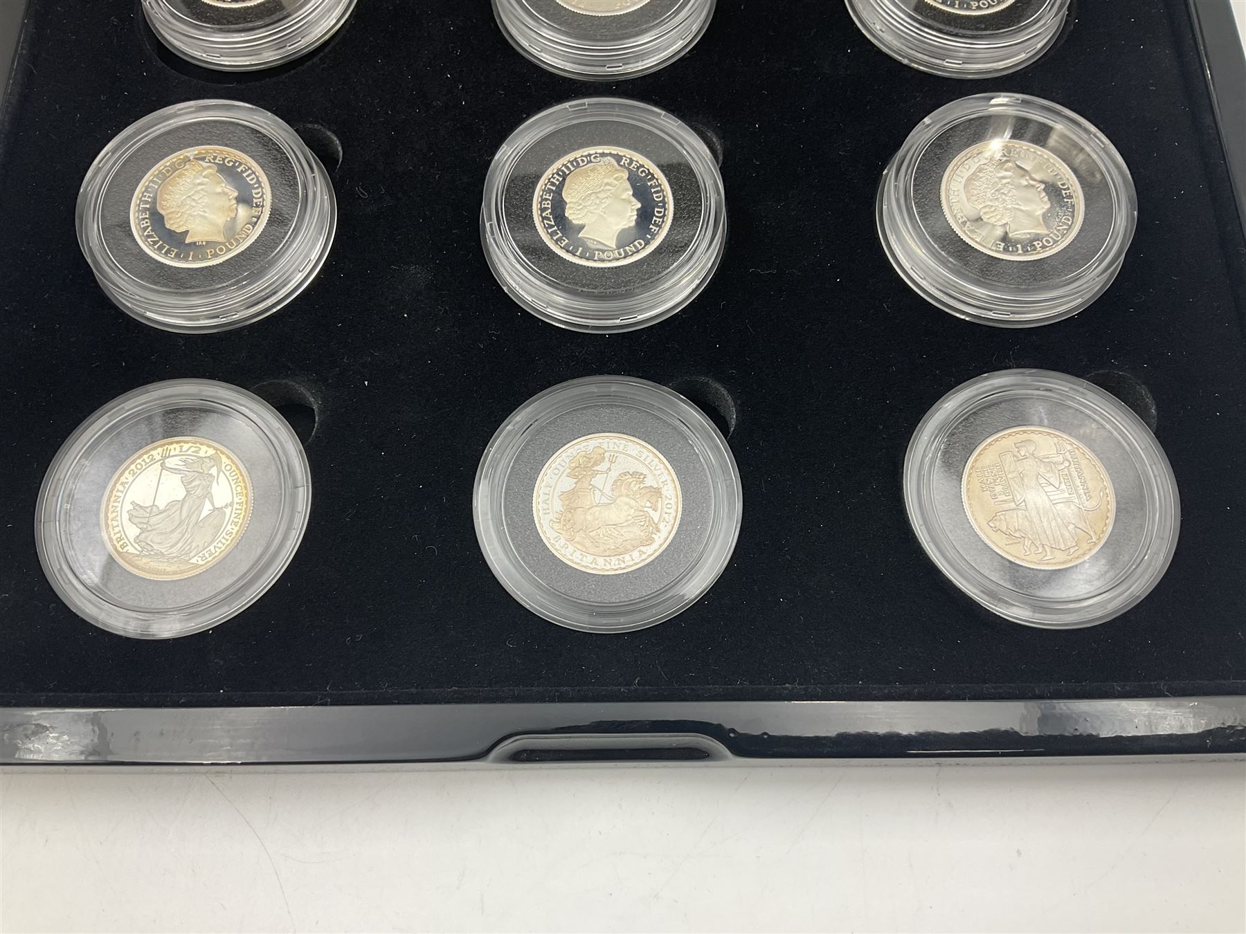 The Royal Mint United Kingdom 2012 'Britannia 25th Anniversary 1987-2012 The Silver Portrait Collection First Strikes' comprising nine half ounce fine silver Britannia coins, cased with certificate