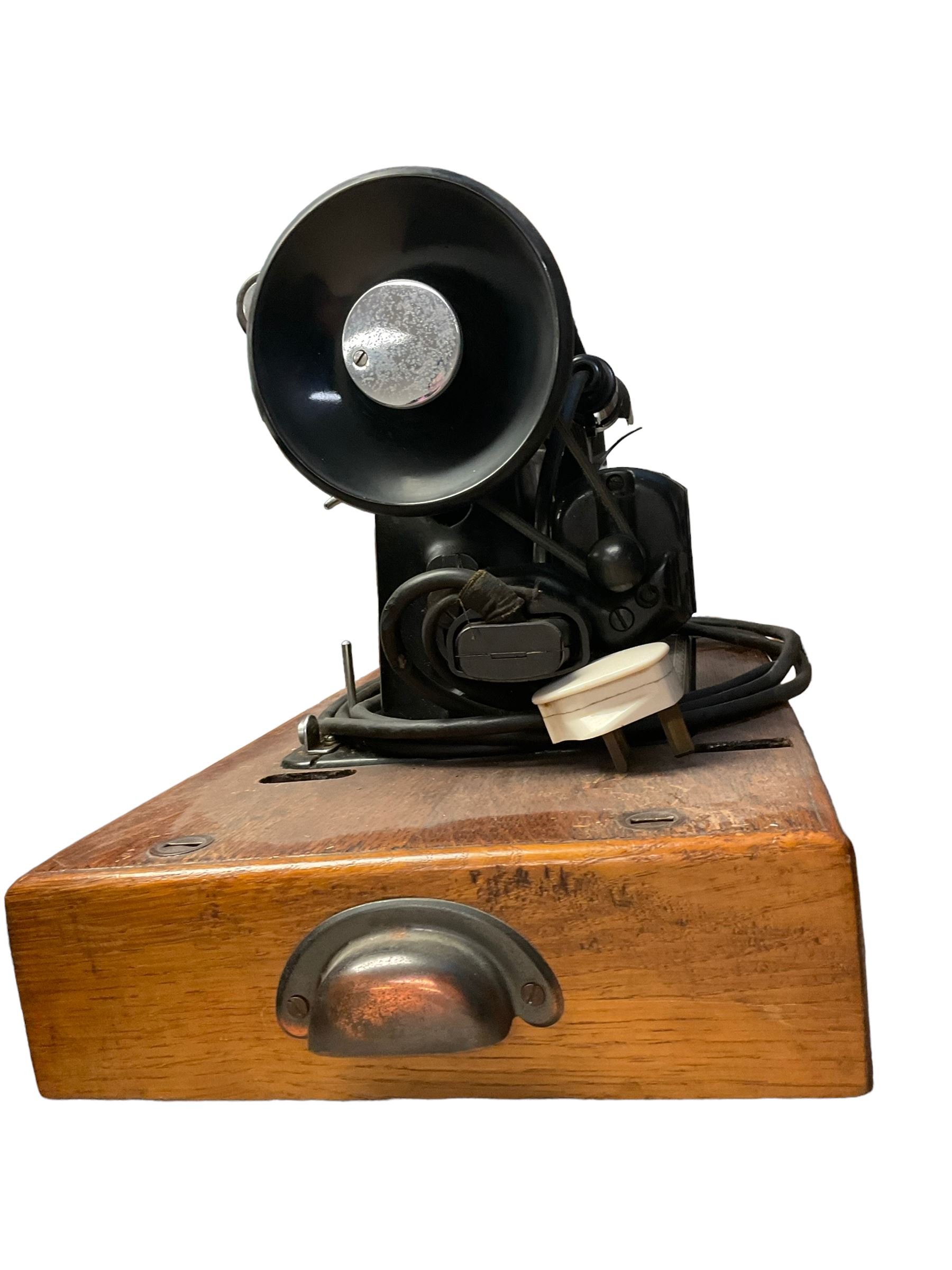 Cased Singer 201K sewing machine