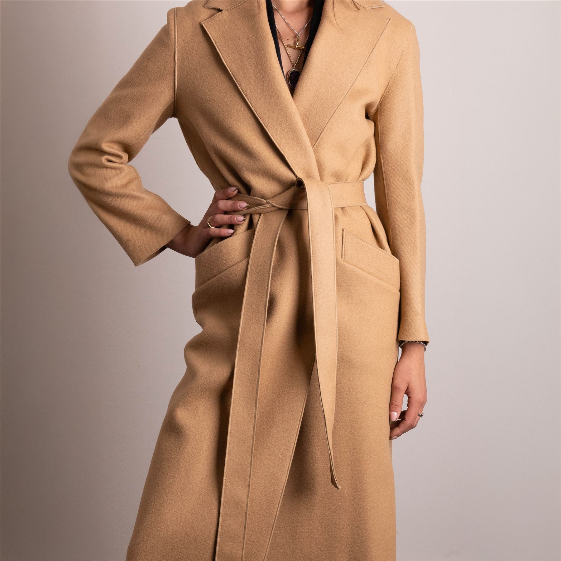 Amanda Wakeley London - full-length coat in camel wool, with notched lapels, concealed front fastening, self-tie belt, and side slip pockets, of minimalist tailored form, from the 'Petite Chic' line, unused