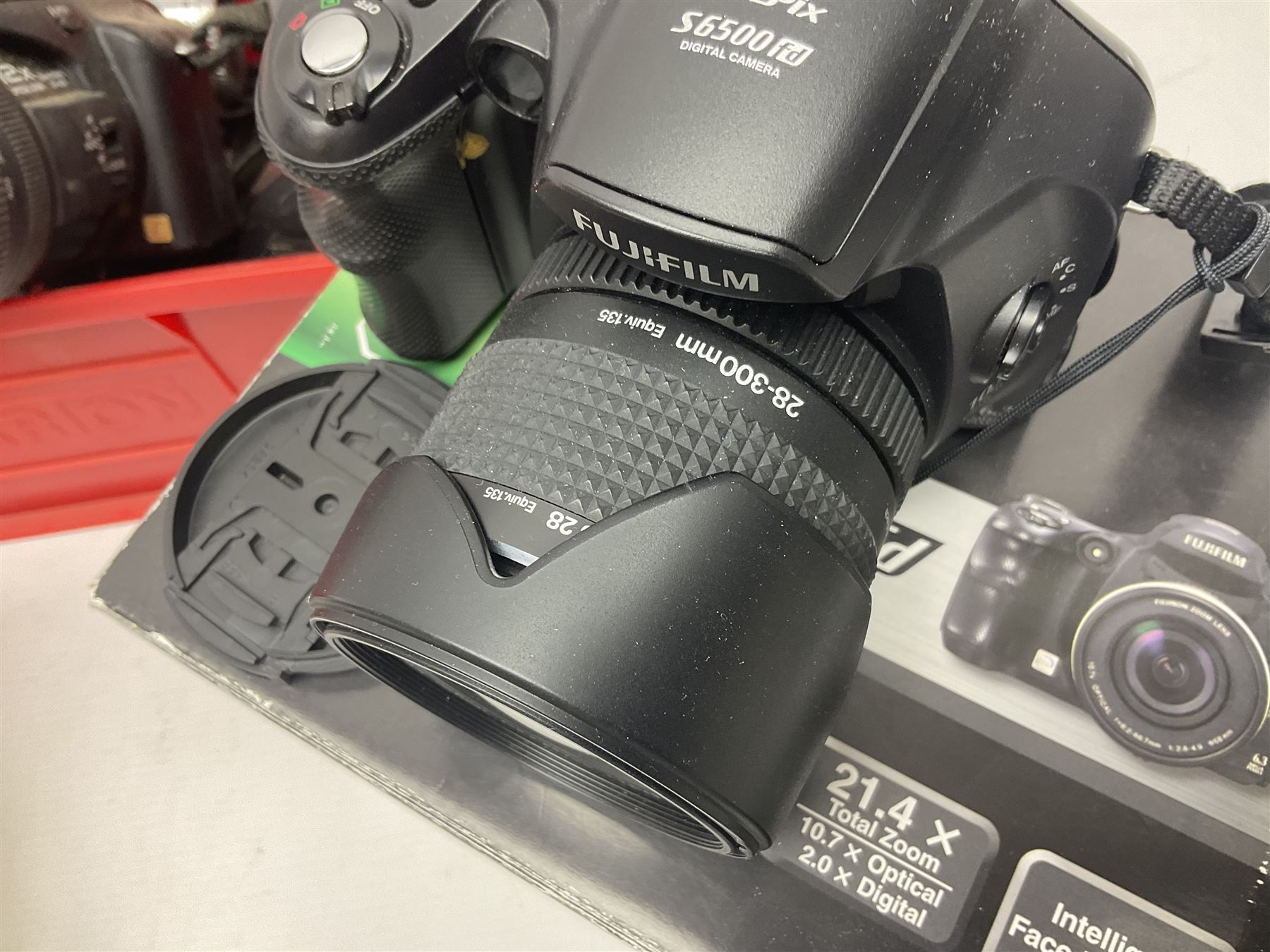 Minolta Dynax 5xi camera body serial no 17222646 with 'AF Zoom Xi 28-80mm 1:4(22)-56' lens serial no 17220881, Minolta SRT101 camera body serial 1944687, Lumix camera body serial no K6SC10168 etc 