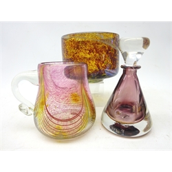  George Elliott Bewdley tankard, of tapering form with clear glass handle the iridescent body with pink mottled panels and amber drapes, etched signature, Mdina mottled brown and opaque glass bowl and Sandur conical scent bottle, H14cm   