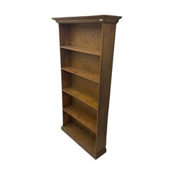 Traditional stained pine 7’ open bookcase, projecting cornice over four shelves