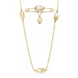 Early 20th century gold pearl necklace, three baroque pears within a wirework setting, spa...