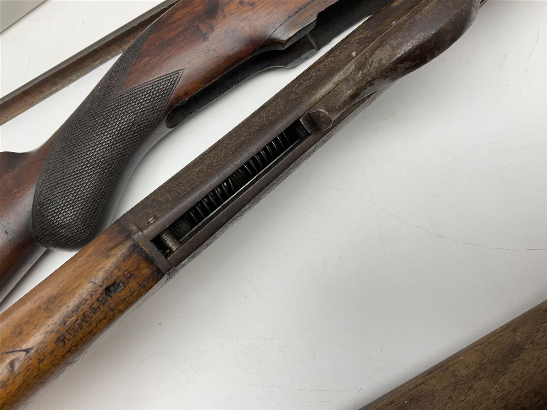 Assorted rifle and pistol spares; early Gem air rifle with sawn off barrel (piece present); telescopic sight; canvas/leather ammunition pouch; Mauser stock; barrel browning solution etc