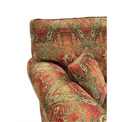 Duresta - 'Beaminster' grande two-seat sofa, traditional shape with rolled arms, upholstered in 'Althorp' russet and stone floral pattern fabric, on turned feet with brass castors
