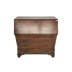 George III mahogany bureau, fall-front enclosing fitted interior, over two short and three long graduating drawers flanked by canted quarter columns, moulded lower edge over bracket feet