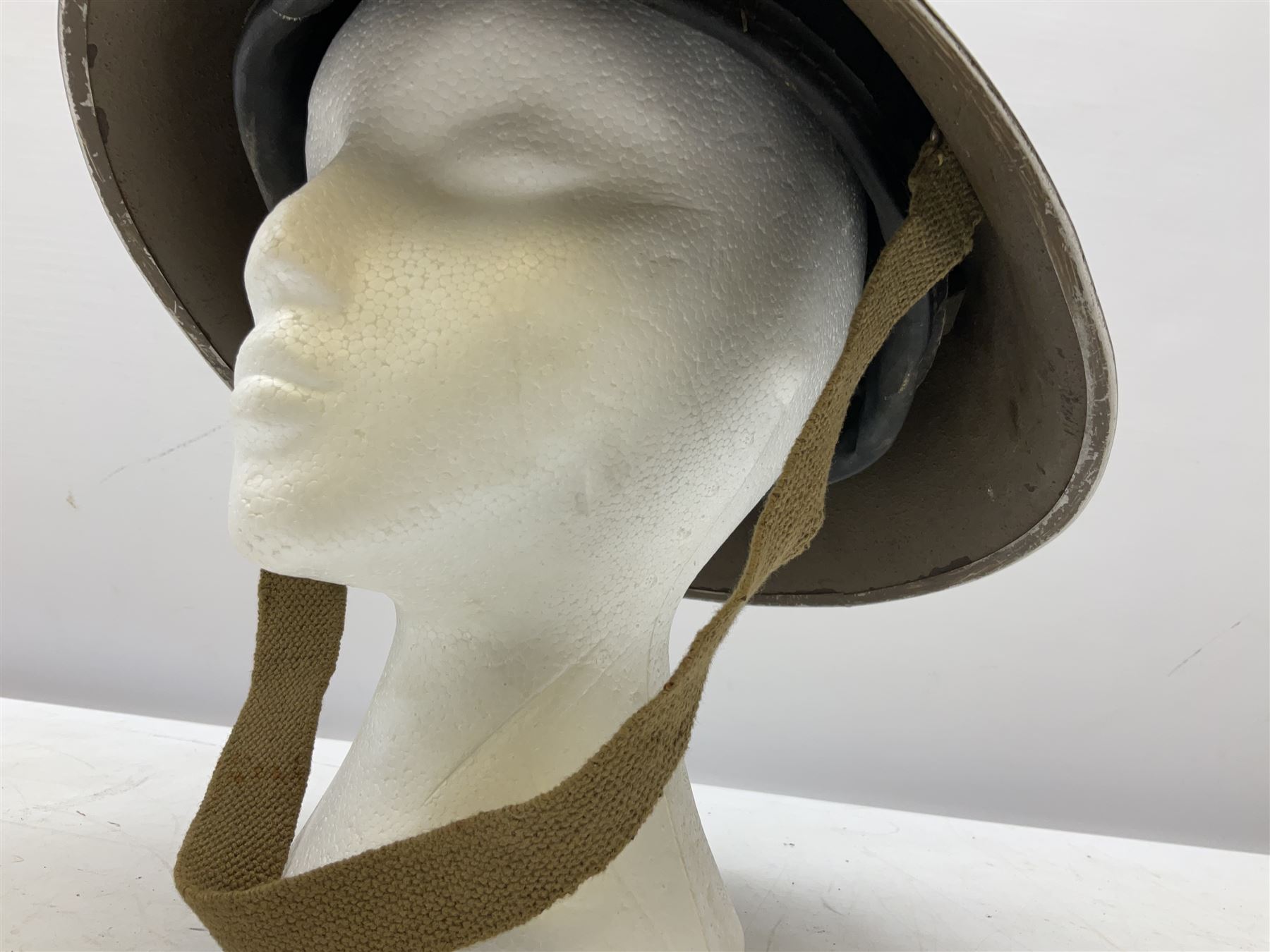 WW2 British Mk III steel combat helmet with textured finish and original liner