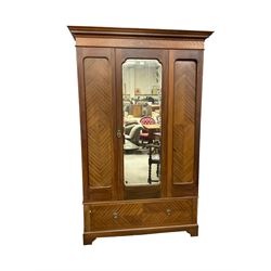 Edwardian mahogany single wardrobe, figured matched veneers to frieze, drawer front and panels, enclosed by bevelled mirror glazed door, base fitted with single drawer, on bracket feet