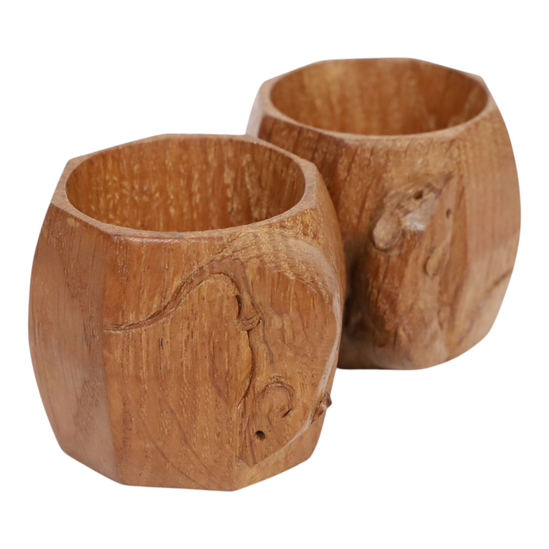Mouseman - pair of dark oak napkin rings, of bulbous octagonal form with signature mouse carving by Robert Thompson of Kilburn