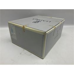 Lladro figure, Holy Night, modelled as Mary kneeling over baby Jesus, sculpted by Vincente Martinez, with original box, no 5796, year issued 1991, year retired 1994, H22cm