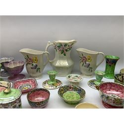 Collection of Mailing lustre ware, to include bowls of various size and form, fruit dishes, pair of candlesticks, tea cups and saucers, etc., together with a small quantity of similar lustre ceramics. 