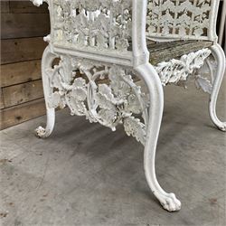 20th century Coalbrookdale design cast iron oak leaf and acorn armchair, white painted cast iron frame with slatted wooden seat, the pierced and shaped back decorated with scrolling oak branches and leafage, flanked by dog mask arm terminals over cabriole supports with paw feet