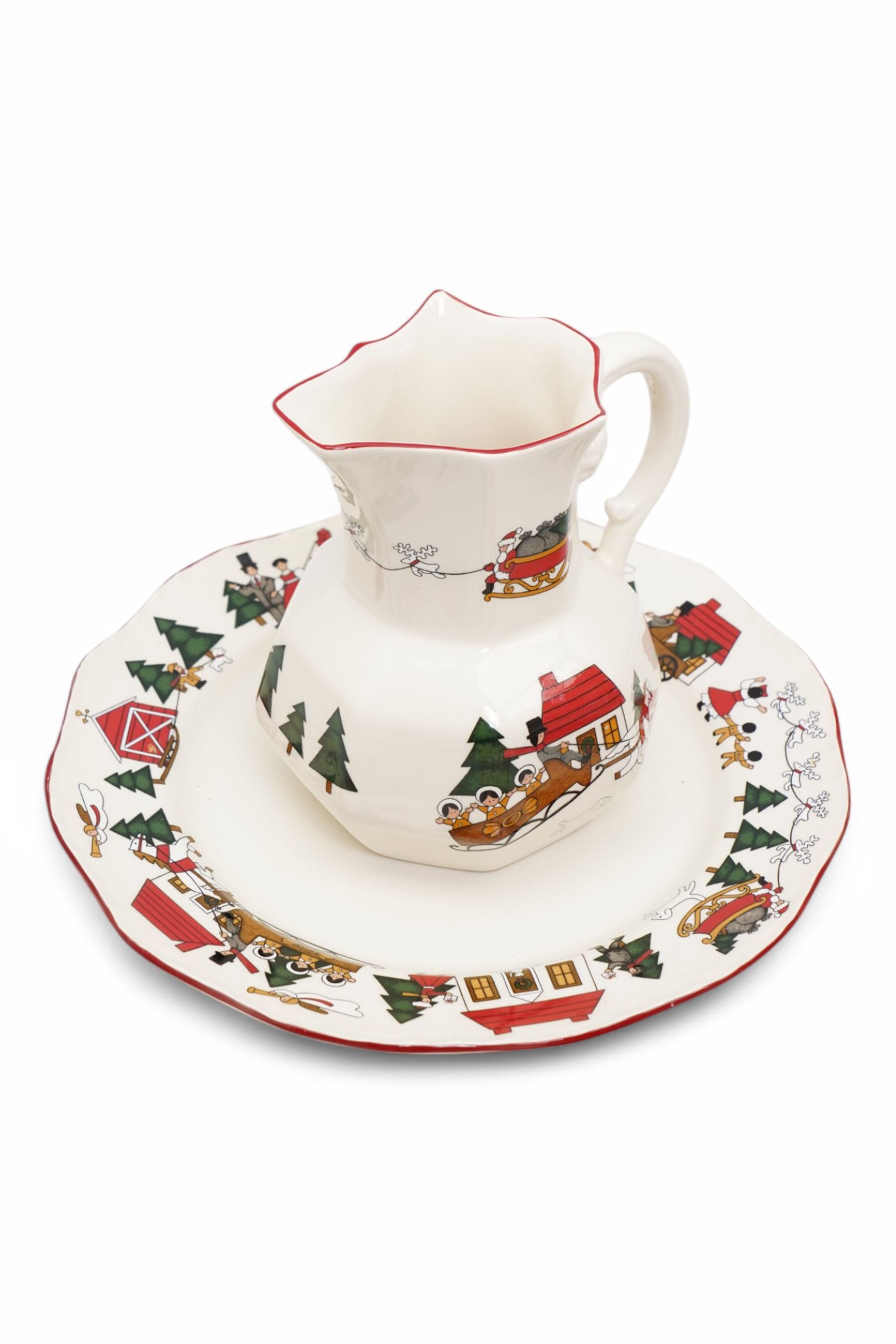 Masons Christmas Village tea wares, designed by Marsten-Mandrajji, comprising three-tiered an other cake stand, large bowl and jug, two twin-handled serving dishes, mug and two teacups, plates of various sizes etc
