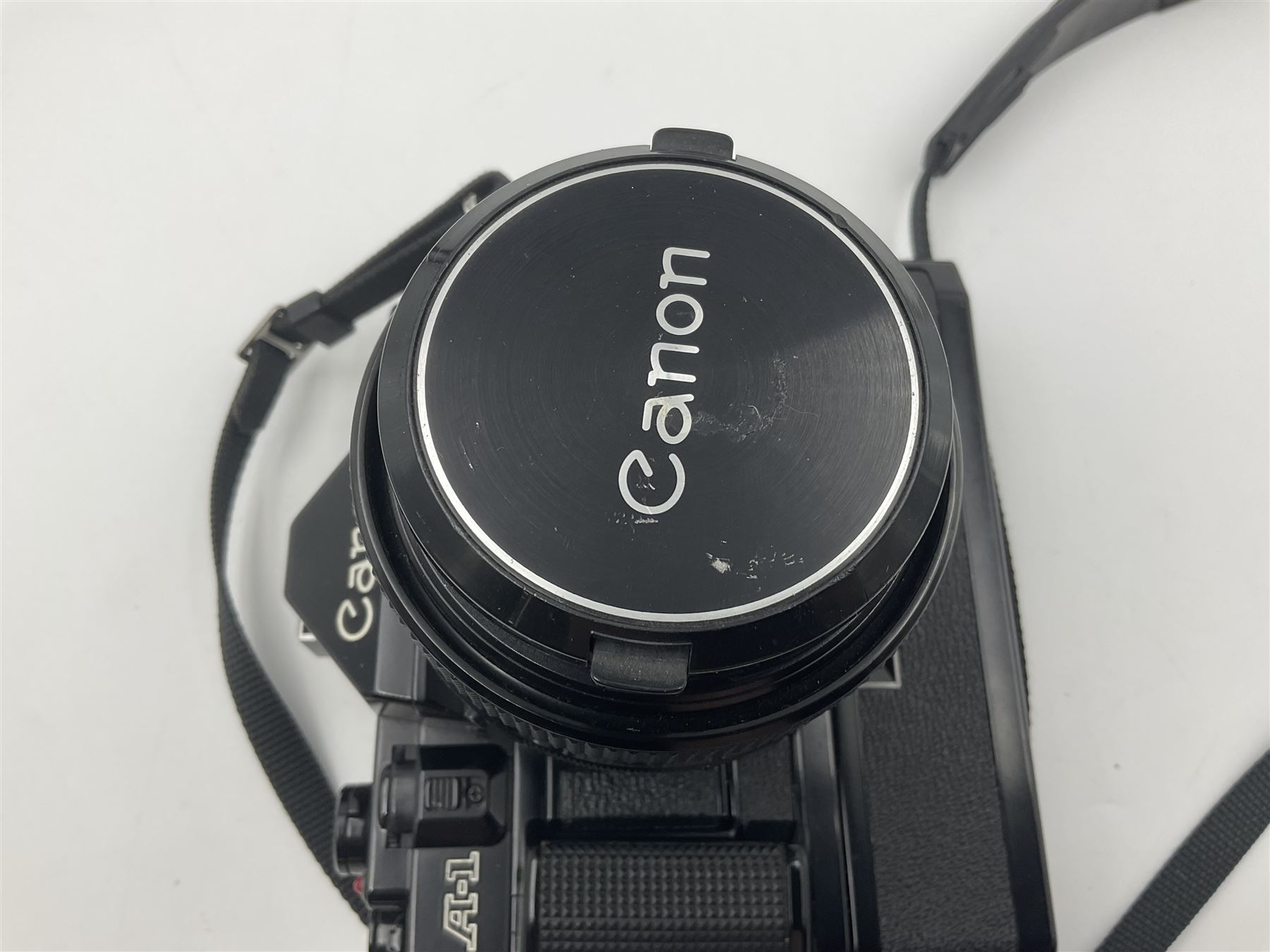 Canon A1 camera body, serial no 884847 with 'Canon FD 55mm 1;1.2 s.s.c' lens serial no 115005