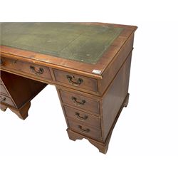 Reproduction yew wood twin pedestal desk, rectangular top with leather inset, fitted with eight drawers