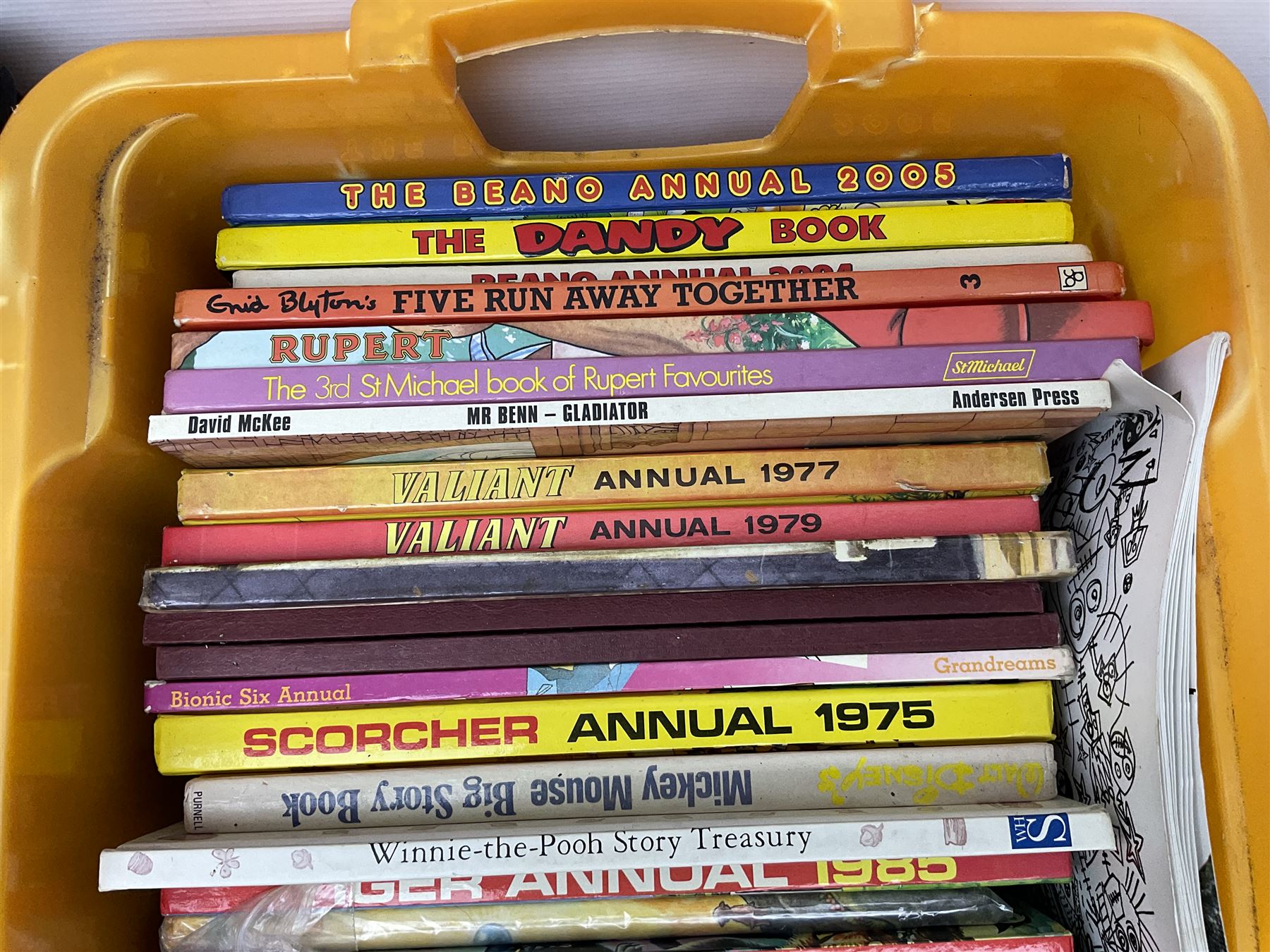 Children's annuals, books and booklets, including Scorcher Annual 1975, Valiant Annual 1977,  Beano Annual 2004, 2005 etc, The Big Enid Blyton Book, various Woman's Weekly magazines, Spot's Magical Christmas by Eric Hill and other similar hardback children's books etc, in four boxes 