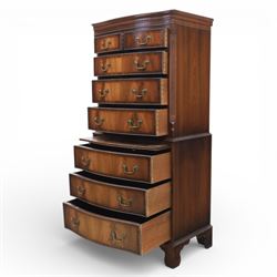 Reprodux - Georgian design mahogany serpentine chest-on-chest, top section with two over three drawer arrangement, flanked by chamfered edges, the lower fixed section, with slide above three drawers, raised on bracket feet  