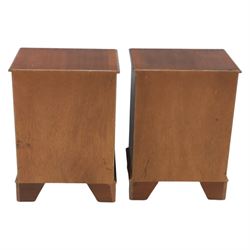 Pair of mahogany bedside lamp tables, fitted with slide, open shelf and three drawers