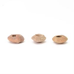 Antiquities; Jewish terracotta oil lamp, with flared decoration and raised fruiting motifs...
