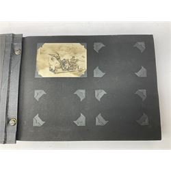 144 Squadron RAF - album containing over one hundred photographs and postcards of varying sizes including group shots, aircraft on the ground and in the air, German aircraft, crashes etc; sizes from 3.5 x 6cm to 16 x 21cm; and quantity of modern reference material
