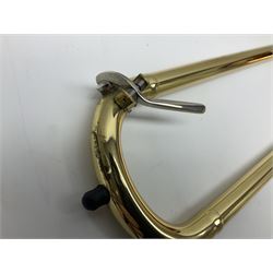 Sebastian Bucklet Aquae Sulis copper and brass trombone No.0910004; in lightweight carrying case; and Kinsman folding tubular chrome music stand in case (2)